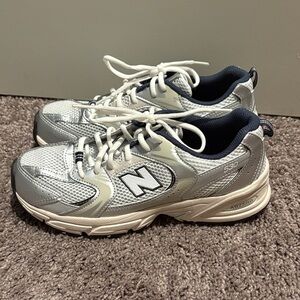 New Balance Silver and White Athletic Shoes